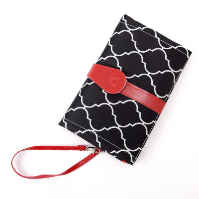 MimiiMe- Mobile und kompakte Wickelunterlage, die zur stylischen Clutch wird