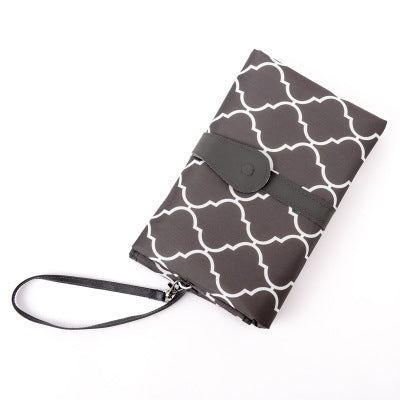 MimiiMe- Mobile und kompakte Wickelunterlage, die zur stylischen Clutch wird