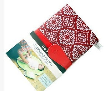 MimiiMe- Mobile und kompakte Wickelunterlage, die zur stylischen Clutch wird